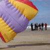 Powerkiten op het strand